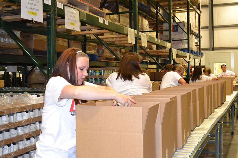 Ozarks Food Harvest volunteers process 60,000 pounds of food weekly